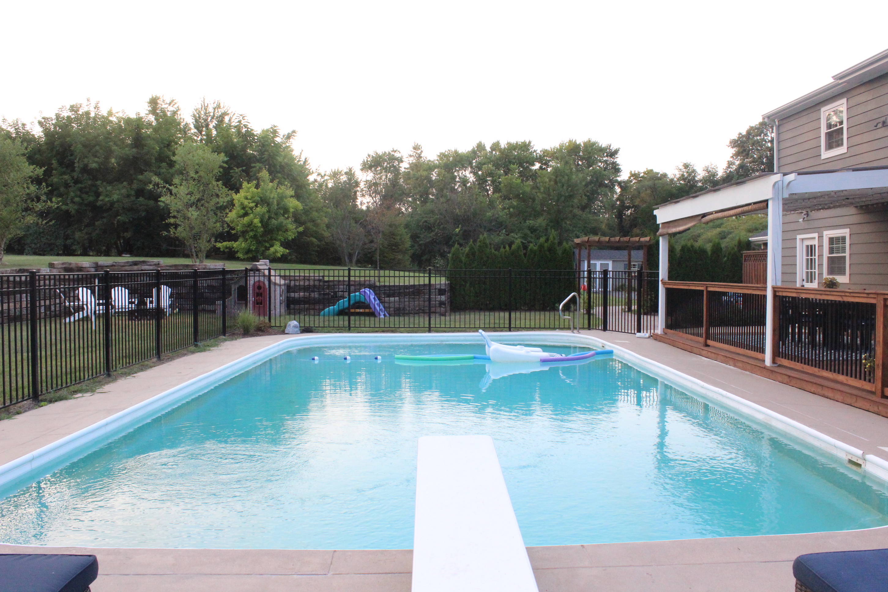 view from diving board across pool